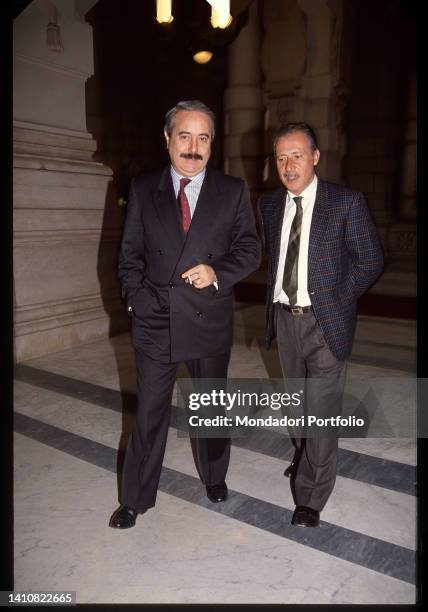 Italian magistrates Giovanni Falcone and Paolo Borsellino during a break at the Palace of Justice. Rome , 1990s