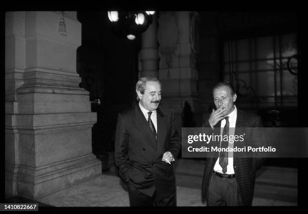 Italian magistrates Giovanni Falcone and Paolo Borsellino during a break at the Palace of Justice. Rome , 1990s