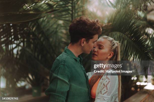 young couple at exotic vacation enjoying time for their-self. - data privacy imagens e fotografias de stock