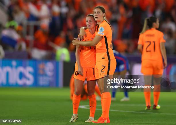 Jackie Groenen and Aniek Nouwen of Netherlands react dejectedly following the final whistle in the UEFA Women's Euro England 2022 Quarter Final match...