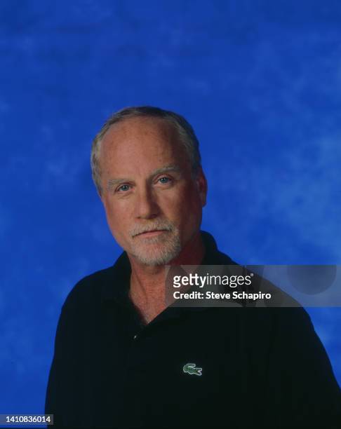 Portrait of American actor Richard Dreyfuss as he poses against a blue background, Los Angeles, California, 1992.