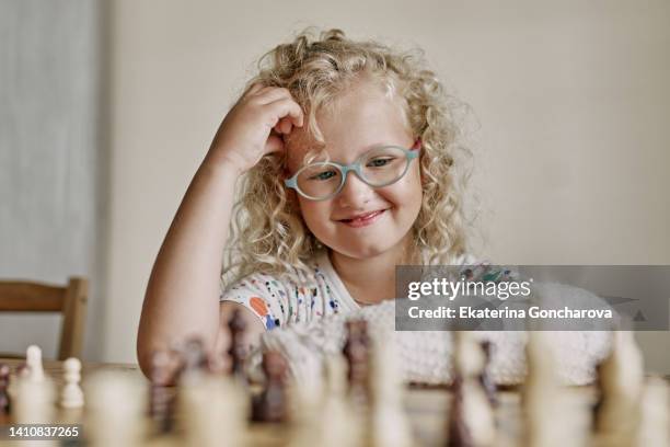 a game of chess. home leisure and board games with children - board game stockfoto's en -beelden