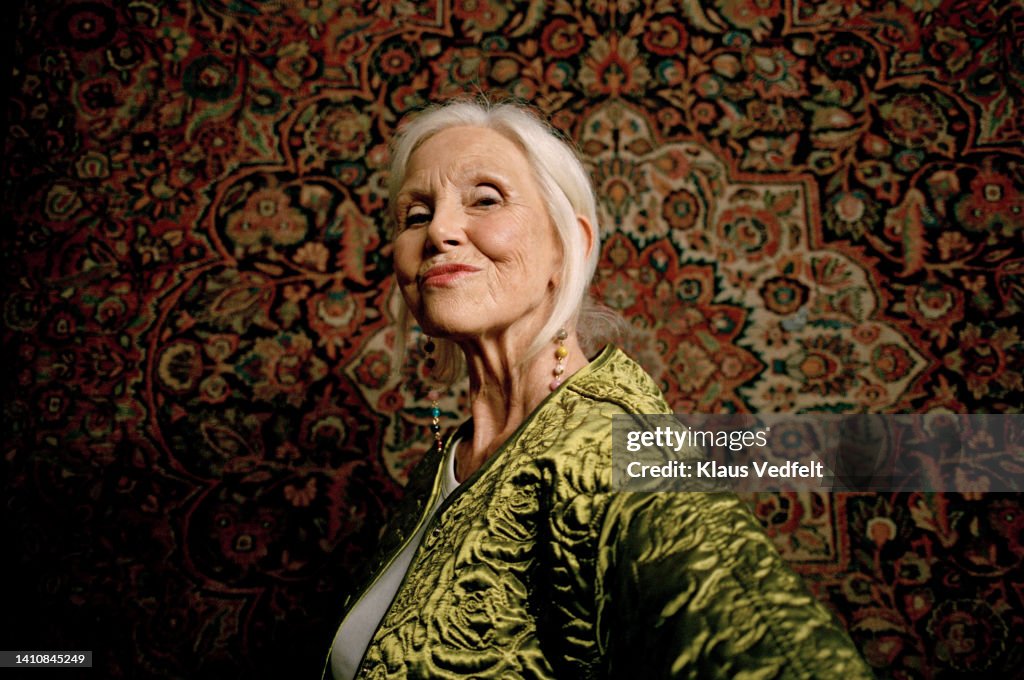 Side view of elderly woman puckering