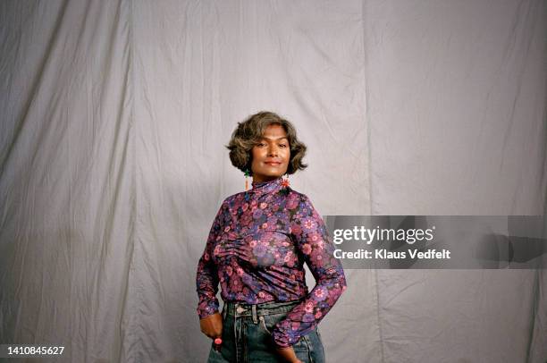 portrait of mature woman with wavy gray hair - attitude stock pictures, royalty-free photos & images