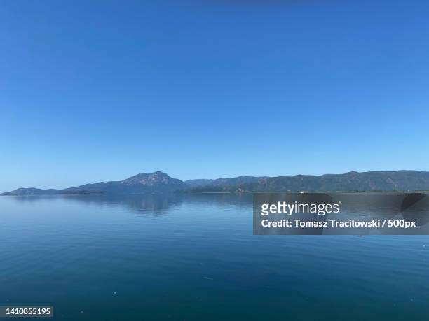 scenic view of lake against clear blue sky,turkey - tracilowski stock pictures, royalty-free photos & images