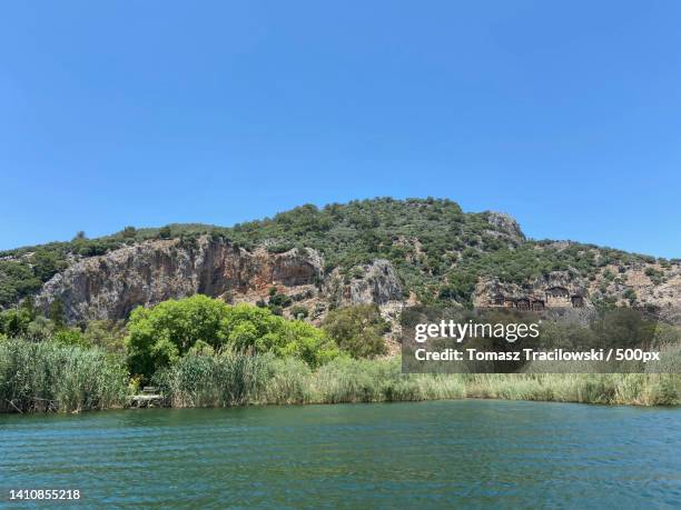 scenic view of sea against clear blue sky,dalyan,turkey - tracilowski stock pictures, royalty-free photos & images