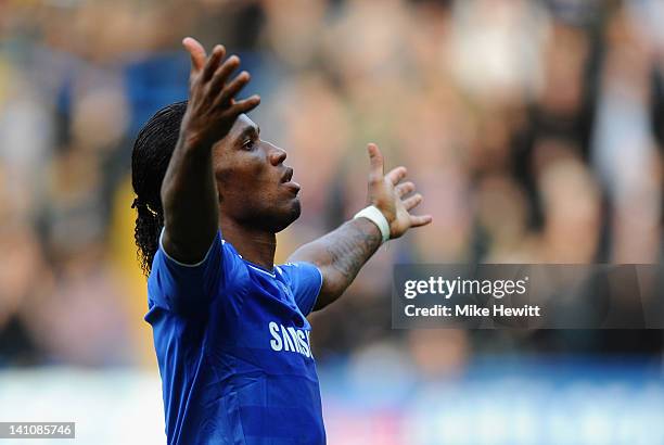 Didier Drogba of Chelsea celebrates the opening goal during the Barclays Premier League match between Chelsea and Stoke City at Stamford Bridge on...