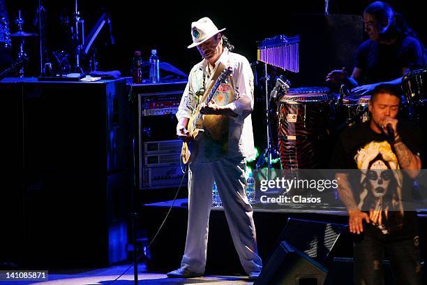 Carlos Santana sing during his concert at the Auditorio Telmex on March 07, 2012 in Zapopan, Mexico.