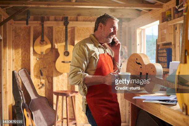 running a small start up - musical instrument repair stock pictures, royalty-free photos & images