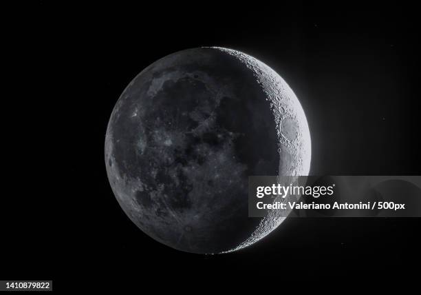 low angle view of moon against sky at night - moon stock pictures, royalty-free photos & images