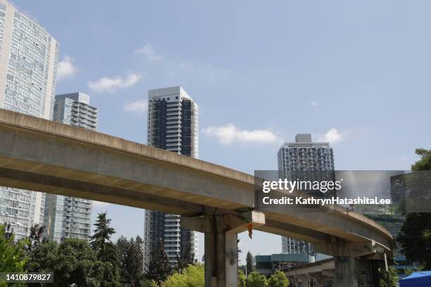 skytrain track in surrey, british columbia, canada - surrey british columbia stock pictures, royalty-free photos & images