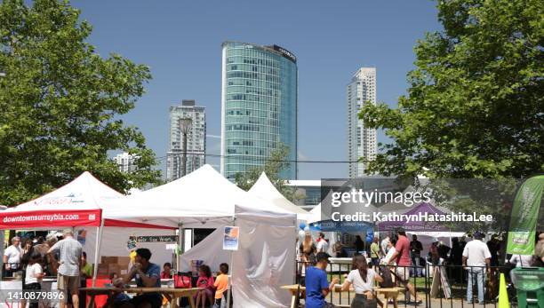 festival in downtown surrey, british columbia, canada - surrey british columbia stock pictures, royalty-free photos & images
