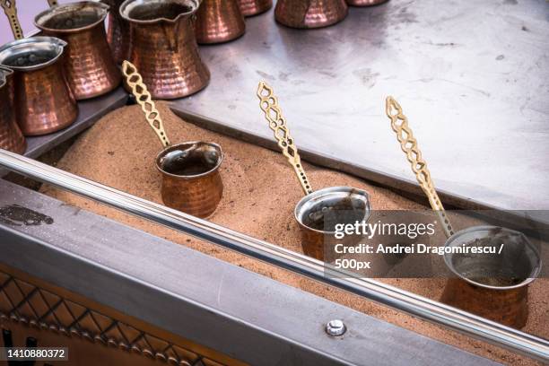 high angle view of old utensils on table - turkish coffee fotografías e imágenes de stock