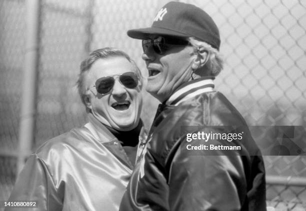 Yankees owner George Steinbrenner and manager Dallas Green share a laugh at the team's training camp. Steinbrenner was making a tour of the facility.