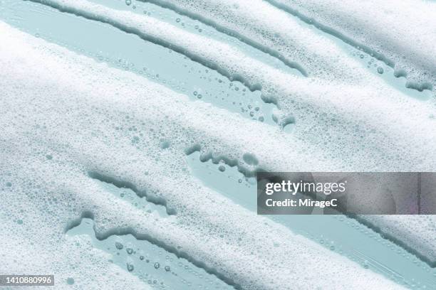 white foam soap suds texture background - bathroom clean closeup stock-fotos und bilder