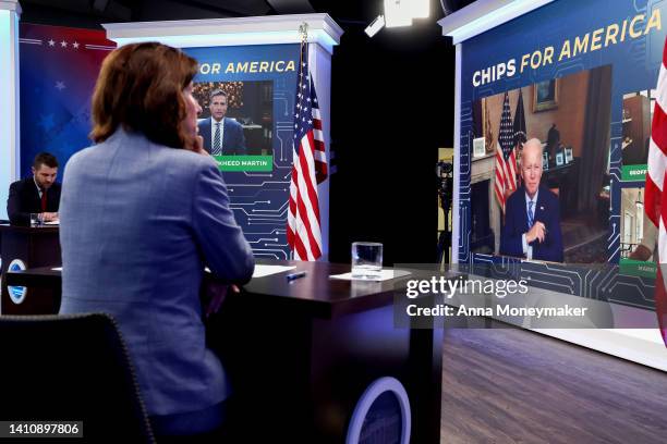 Secretary of Commerce Gina Raimondo listens as U.S. President Joe Biden participates virtually in a meeting on the Creating Helpful Incentives to...