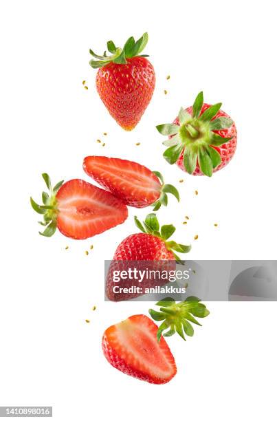 fresh strawberries in air - strawberries stockfoto's en -beelden