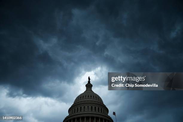 Thunderstorm clouds roll over the U.S. Capitol on July 25, 2022 in Washington, DC. The storms prevented many members of Congress from returning to...