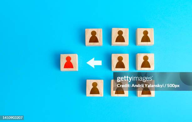 business concept flat lay with wooden square shapes on blue background,ukraine - tangram stock-fotos und bilder