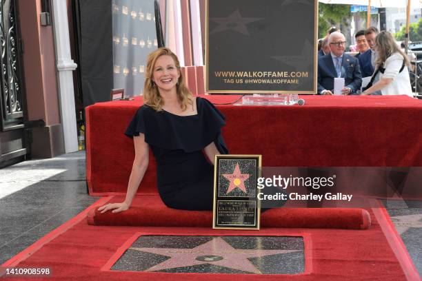 Laura Linney poses during the Laura Linney Hollywood Walk of Fame Ceremony at Hollywood Walk Of Fame on July 25, 2022 in Los Angeles, California.