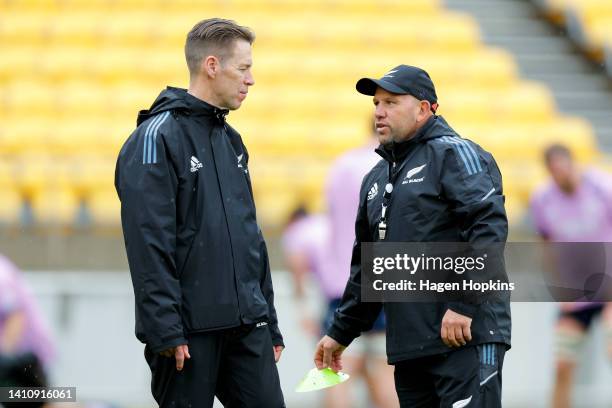 Assistant Coach Jason Ryan talks to Manager Darren Shand during a New Zealand All Blacks Training Session at Sky Stadium on July 26, 2022 in...