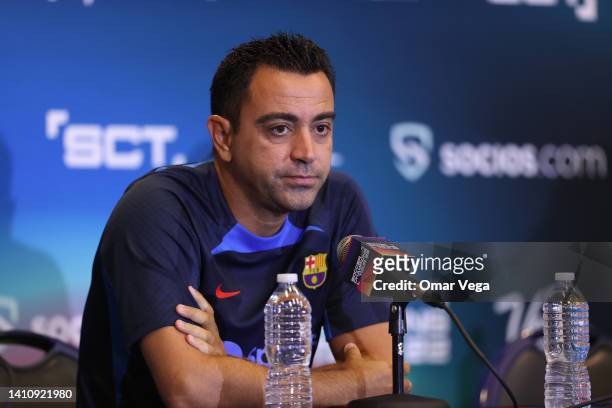 Head coach of Barcelona Xavi Hernandez speaks during a press conference ahead of a match between FC Barcelona and Juventus FC at Cotton Bowl on July...