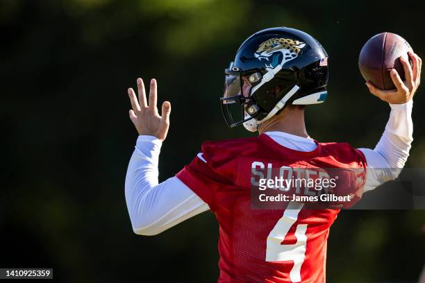 Kyle Sloter of the Jacksonville Jaguars throws a pass during Training camp on July 25, 2022 at Episcopal High School in Jacksonville, Florida.