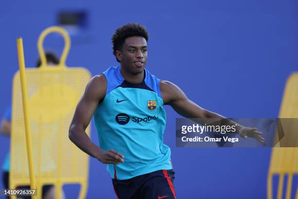 Alejandro Balde of Barcelona warms up during a training session ahead of a match between FC Barcelona and Juventus FC at Cotton Bowl on July 25, 2022...