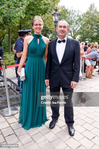 Franconian Wine Queen Eva Brockmann and German politician Hubert Aiwanger attend the Bayreuth Festival 2022 Opening And State Reception on July 25,...