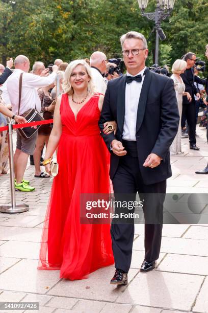 German politician Melanie Huml and her husband Markus Huml attend the Bayreuth Festival 2022 Opening And State Reception on July 25, 2022 in...