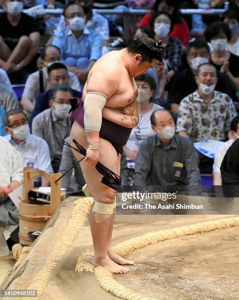 Endo reacts after his defeat by Sadanoumi on day six of the Grand Sumo Nagoya Tournament at Dolphin's Arena on July 15, 2022 in Nagoya, Aichi, Japan.