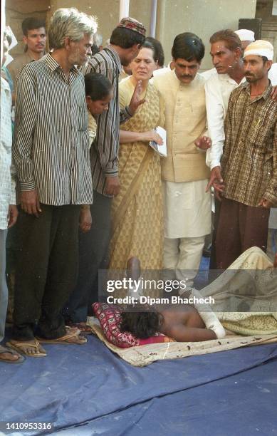 Sonia Gandhi with other party leaders visit riot affected area in Ahmedabad Gujarat India on 8th March 2002.