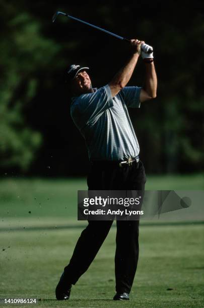 Tom Lehman of the United States follows his shot off the fairway during the WorldCom Classic - The Heritage of Golf golf tournament on 13th April...