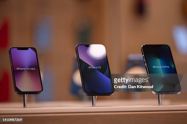 Iphone 13's on display during a press preview of Apple's new Knightsbridge store on July 26, 2022 in London, England. Apple has 520 stores across the...