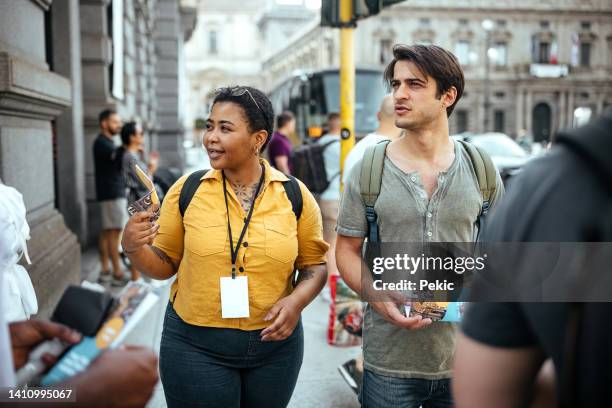 having a tour through the city - guidebook stock pictures, royalty-free photos & images