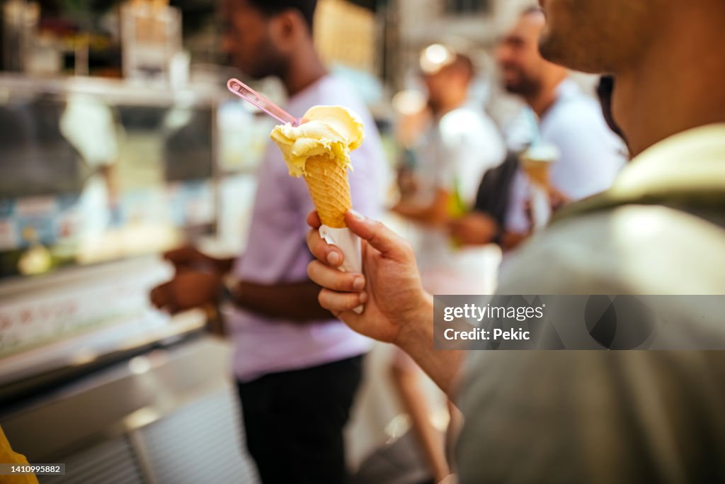 Tourists buying ice cream in the city