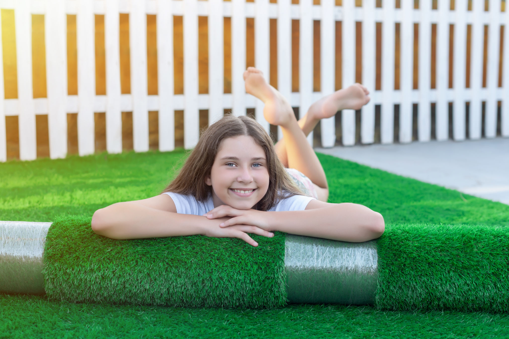 enjoying synthetic lawn