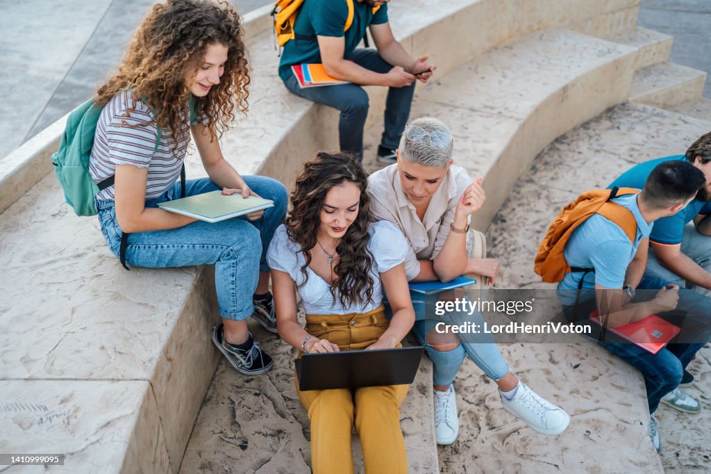 Student Read Notes Female Students Read Notes On The Laptop High-Res Stock Photo - Getty ...