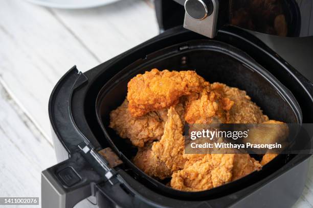 air fryer machine with chicken - fried chicken white background stock pictures, royalty-free photos & images