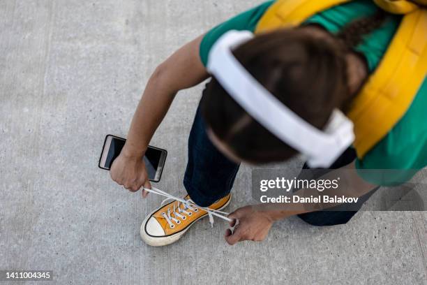 urban lifestyle. woman on citybreak. - yellow shoe stock pictures, royalty-free photos & images