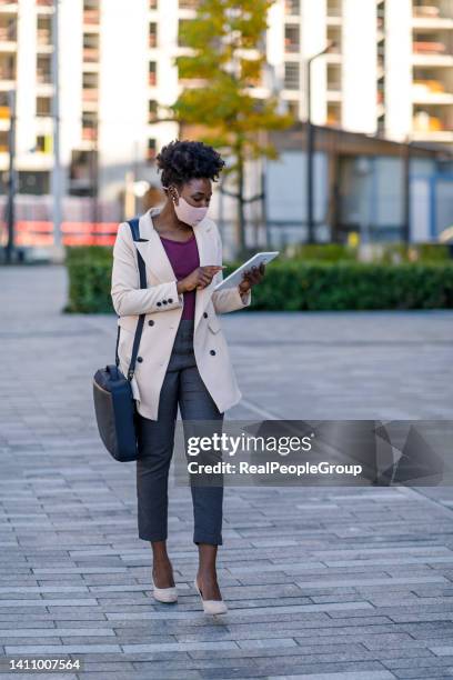 checking what's on the schedule today - laptop bag mask stock pictures, royalty-free photos & images
