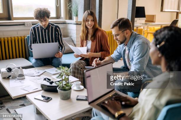 colleagues working together in the office - generation z workforce stock pictures, royalty-free photos & images