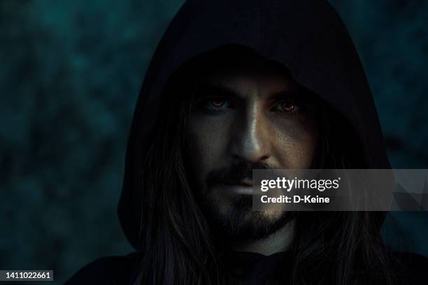 mysterious man - wizard stock pictures, royalty-free photos & images