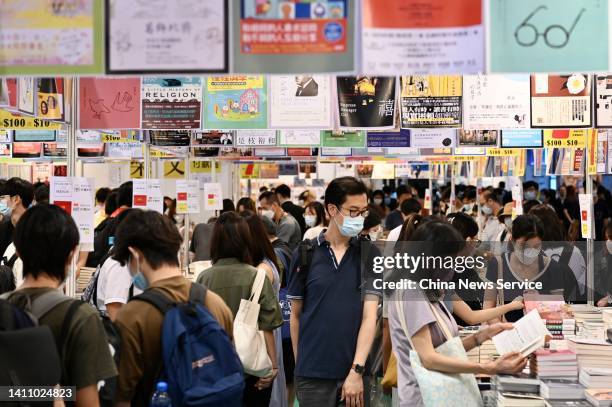 People visit the 32nd Hong Kong Book Fair at Hong Kong Convention and Exhibition Centre on July 26, 2022 in Hong Kong, China.