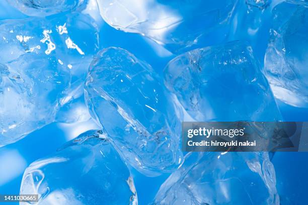 ice cube - ice cubes falling stock pictures, royalty-free photos & images