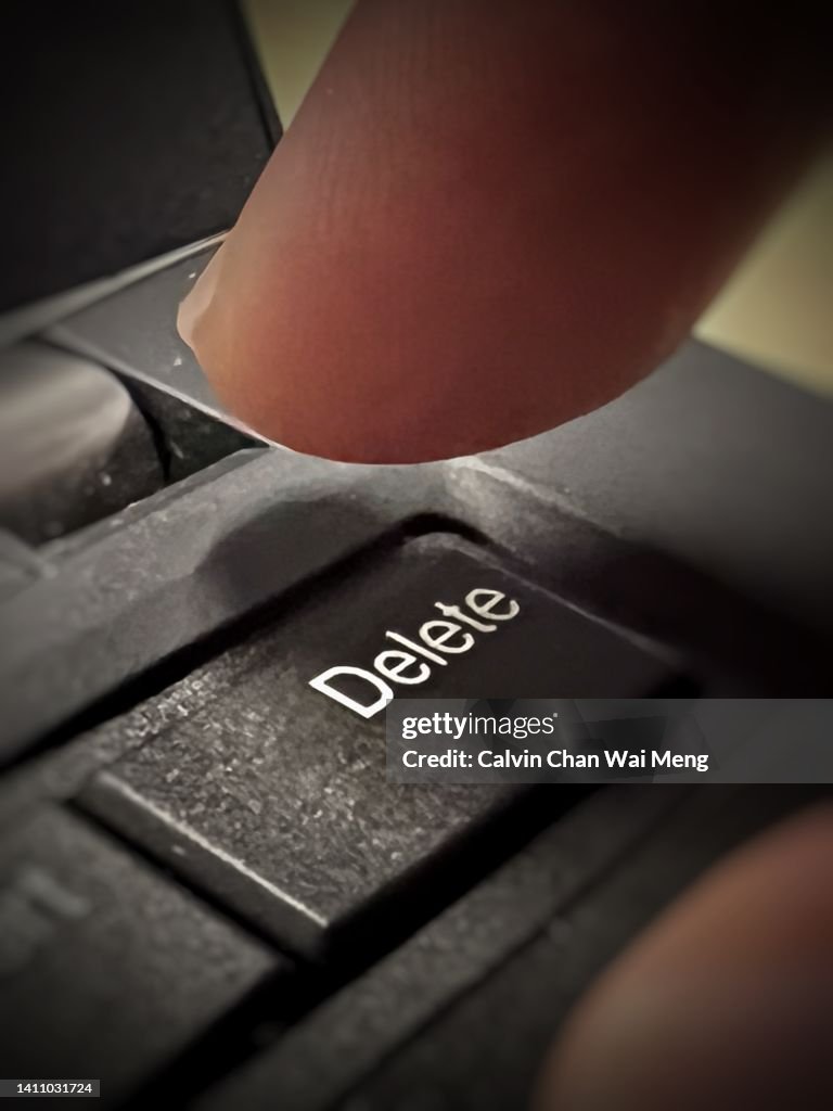 Delite Key Finger About To Hit Delete Key High-Res Stock Photo - Getty Images