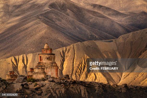 ancient chortens  in tange, upper mustang, nepal. - nepal stock pictures, royalty-free photos & images