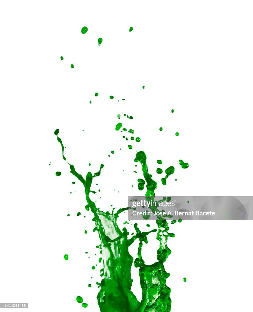 Sprayed drops of green paint on a white background.