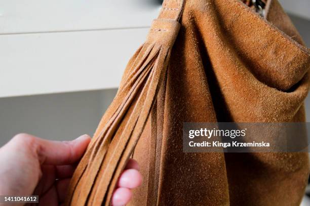 suede bag - suede fabric stock pictures, royalty-free photos & images