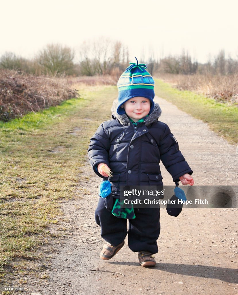 Toddler walking in park